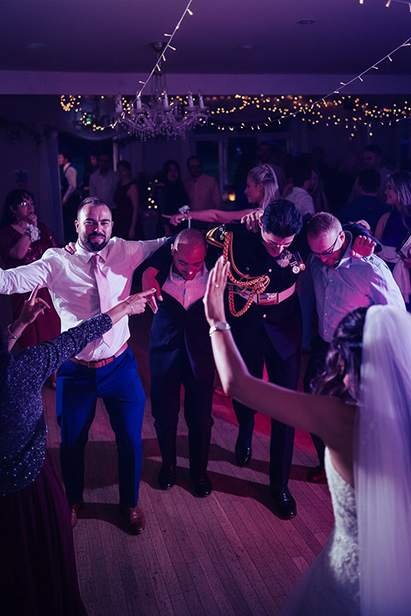 Wedding guests enjoying the dancefloor with a professional DJ in Hampshire